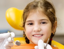 Girl Sitting in a Dental Chair in St. Augustine, Florida